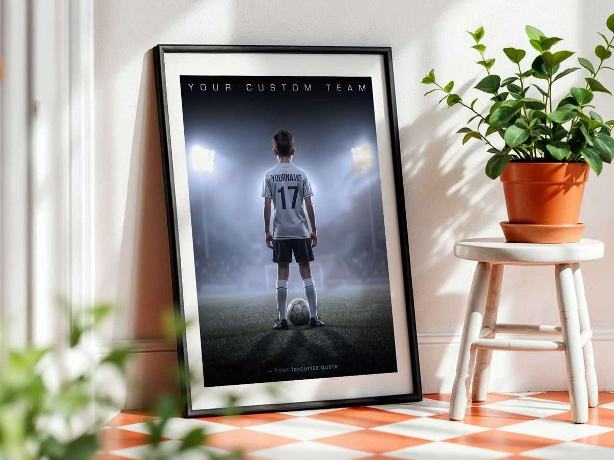 Gallery wall featuring framed match posters, minimalist prints, and a central nameplate above a study desk