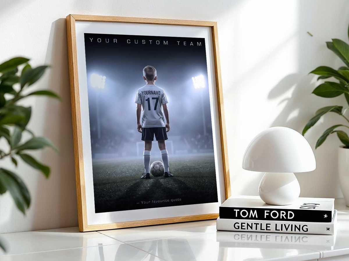 Low-glare picture light and adjustable LED strip creating warm ambient light around a soccer poster above a study desk