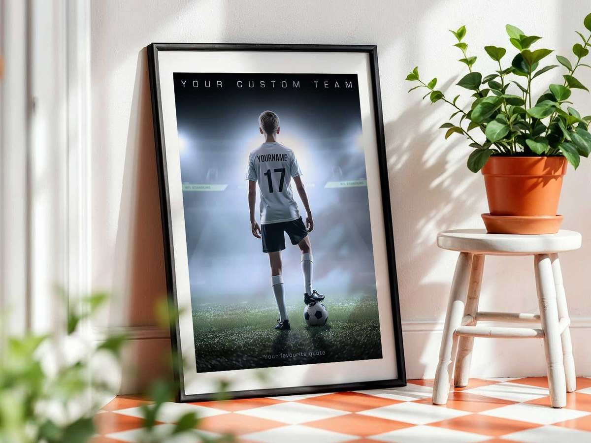 Framed vintage-style soccer poster leaning against a wall in a living room